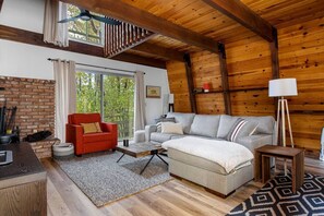 Rustic simplicity with modern touches in this open living room space where you can hang with the crew after a day in the mountains.