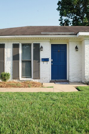 Look for the bright blue door. Welcome!