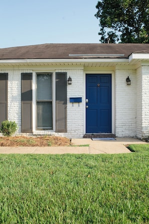 Look for the bright blue door. Welcome!