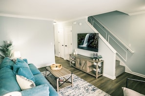 Enjoy a movie or show on your big-screen smart TV for a cinematic experience in the comfort of your own home.