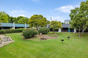 Discover the perfect harmony of productivity and tranquility, where guests find inspiration amidst lush greenery, fostering a serene and conducive environment for work and relaxation."