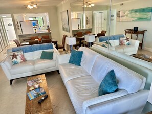Stunning new sofa and loveseat.  Very comfortable. 65” tv . Ocean views