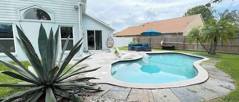 Huge backyard with a round swing, egg chair swing, seating area, charcoal grill and outdoor umbrella with led lights
****pool can be heated upon request 2 day minimum, see property description for more detail