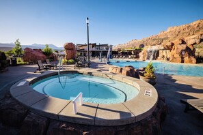 Hot tub overlooking pool and Bocce Ball court