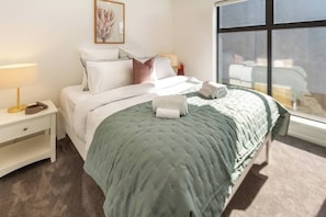 Spacious Bedroom - Hotel Quality Queen Bed, Soft Linen, Fluffy Cushions and Fresh Towels