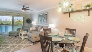 living room and dining area with captivating views