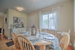 Gather for takeout or a home cooked meal with friends and family in the cozy dining room. A high chair is available.