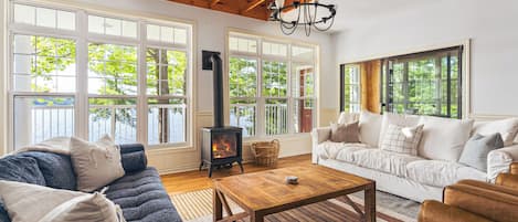 Living room with plenty of comfy seating and an indoor fireplace!