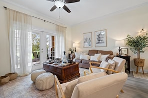 Spacious and Inviting Living Room with Golf Course View.