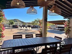 Covered outdoor dining + view of Phoenix Mountain Preserves.