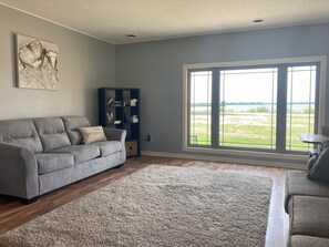 Beautiful lake views from the living room which has a queen pullout sofa.