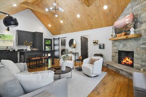 Open living space, vaulted ceilings, bright natural light
