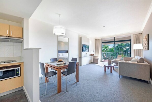 Enjoy home-cooked meals at home with a four-seater table.