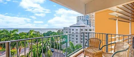 Enjoy your own private, furnished balcony that features a backdrop of Darwin city views and protection against the elements.