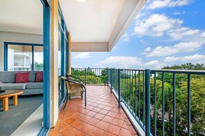 Enjoy your morning out on the balcony, taking in lush views across the Esplanade and out toward the water