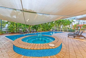 Lounge on the outdoor sunbeds and if needed, find protection from the sun with a pool that is partly-shaded