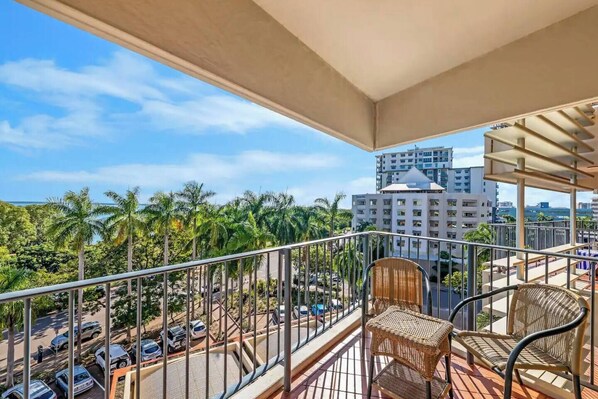 Enjoy a private, furnished balcony that features a backdrop of beautiful sea views and protection against the elements.