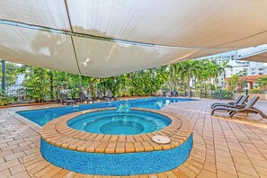 Lounge on the outdoor sunbeds and if needed, find protection from the sun with a pool that is partly-shaded