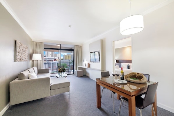 Unit 325 - The spacious one bedroom apartment has a private balcony and sun-soaked living room with a TV and Wi-Fi