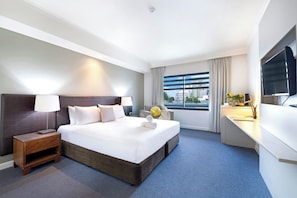Unit 324 - An adjacent modern studio apartment offers up a comfortable king bed, television and its own ensuite bathroom