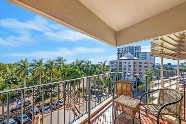 Enjoy a private, furnished balcony that features a backdrop of beautiful sea views and protection against the elements.