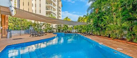 Lounge on the outdoor sunbeds and if needed, find protection from the sun with a pool that is partly-shaded.