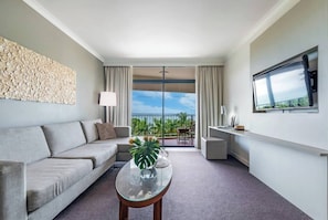 The spacious one-bedroom apartment has a private balcony and sun-soaked living room with a TV and Wi-Fi.