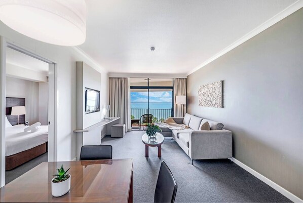 The one bedroom apartment’s open-plan design allows for seamless indoor-outdoor living with water views