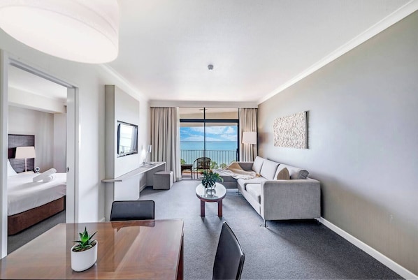 The one bedroom apartment’s open-plan design allows for seamless indoor-outdoor living with water views