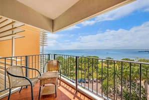 Your private furnished balcony can be accessed via the sun-soaked living room and offers beautiful water views