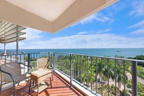 Your private furnished balcony can be accessed via the sun-soaked living room and offers beautiful water views.