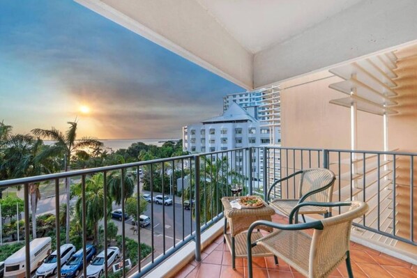 Your private furnished balcony can be accessed via the sun-soaked living room and offers beautiful water views