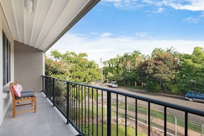 Enjoy your morning coffee on the balcony overlooking a quiet street