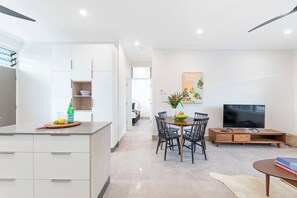A four-person dining table makes it easy for guests to come together for a meal at home, or use for setting up a laptop.
