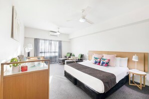 The spacious studio highlights a king-size bed, air-conditioning and two ceiling fans to keep things cool.
