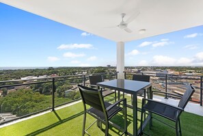 Enjoy a barbeque in the outdoor dining setting. A ceiling fan ensures comfort on still summer nights.