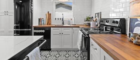 Stunning, fully equipped kitchen with a retro vibe. Make this your home away from home. A place to cook all your family  get togethers and amazing nightly cuisine.