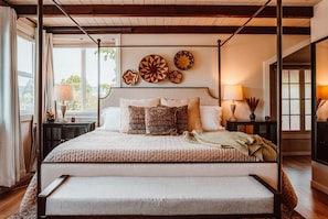 King bed with mountain views