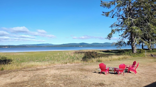 Enjoy a day at the beach and return to your own 1.5-acre fenced private bay property