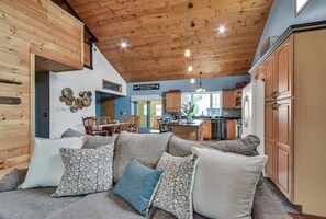Open concept kitchen/dining/living room.
