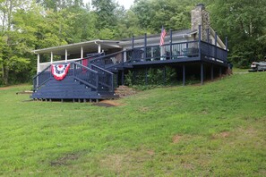 back porch facing lake, lots of sitting area 