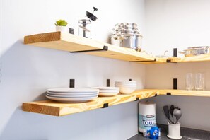 Fully equipped kitchen (coffee pot, french press, toaster, blender, pots/pans, dinnerware, utensils, cooking sheets, & more)