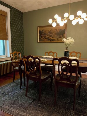 Ample space in the dining room to enjoy a meal together with loved ones.