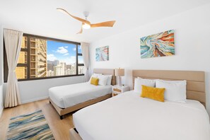 Relax at your bedroom with 1 queen-size and 1 full-size beds