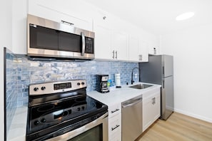 Enjoy making your delicious meals at this full-equipped kitchen!
