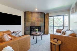 Wood burning fireplace and access to private balcony
