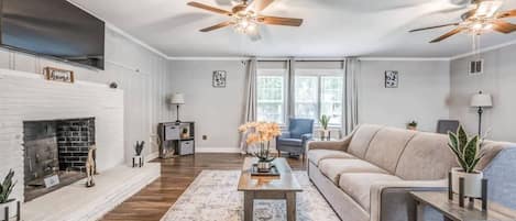 Living room with decorative fireplace