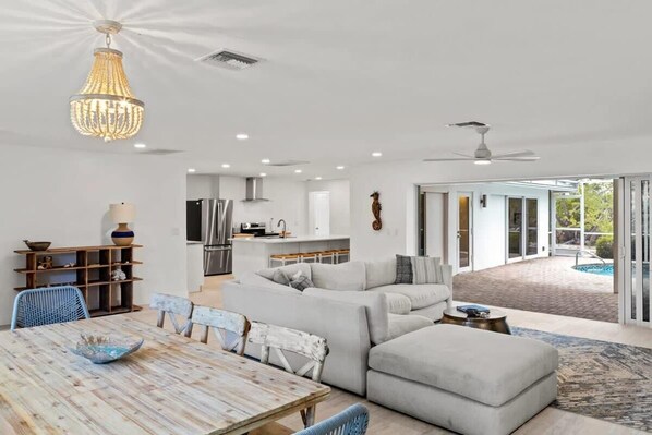 Bright and spacious living area with smart TV