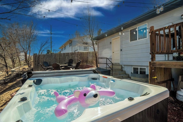 Sink into the private hot tub and let the warm water melt away stress. With string lights overhead and a peaceful setting, this backyard retreat is perfect for unwinding after a day of adventure.