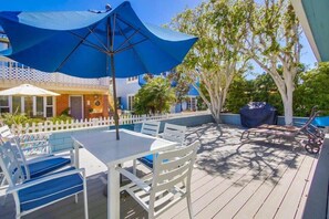 Outdoor dining table and gas grill
